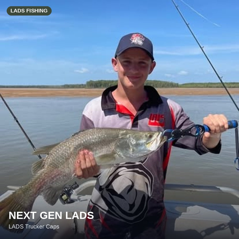 Next Gen LADS - young angler with a barra in a LADS Trucker Cap
